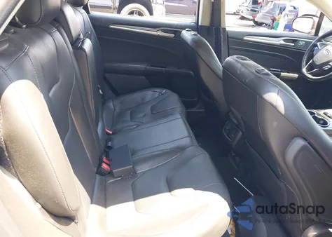 2016 Ford Fusion Hybrid Titanium from USA, damaged, VIN 3FA6P0RUXGR281509